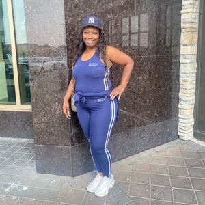 Three piece track suits.